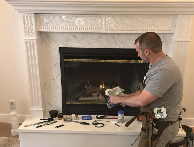 Watertown Chimney Sweep performing fireplace maintenance in Watertown, CT